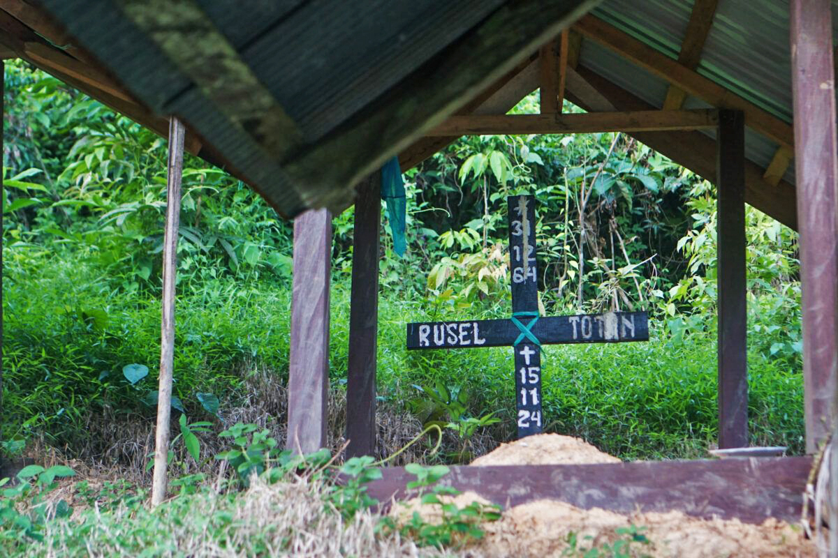 Borneo killing linked to coal industry stays unsolved as Indonesia VP visits Dayak village 3 The burial of Dayak elder Rusel, who died in the attack by unknown assailants while guarding a coal hauling post.