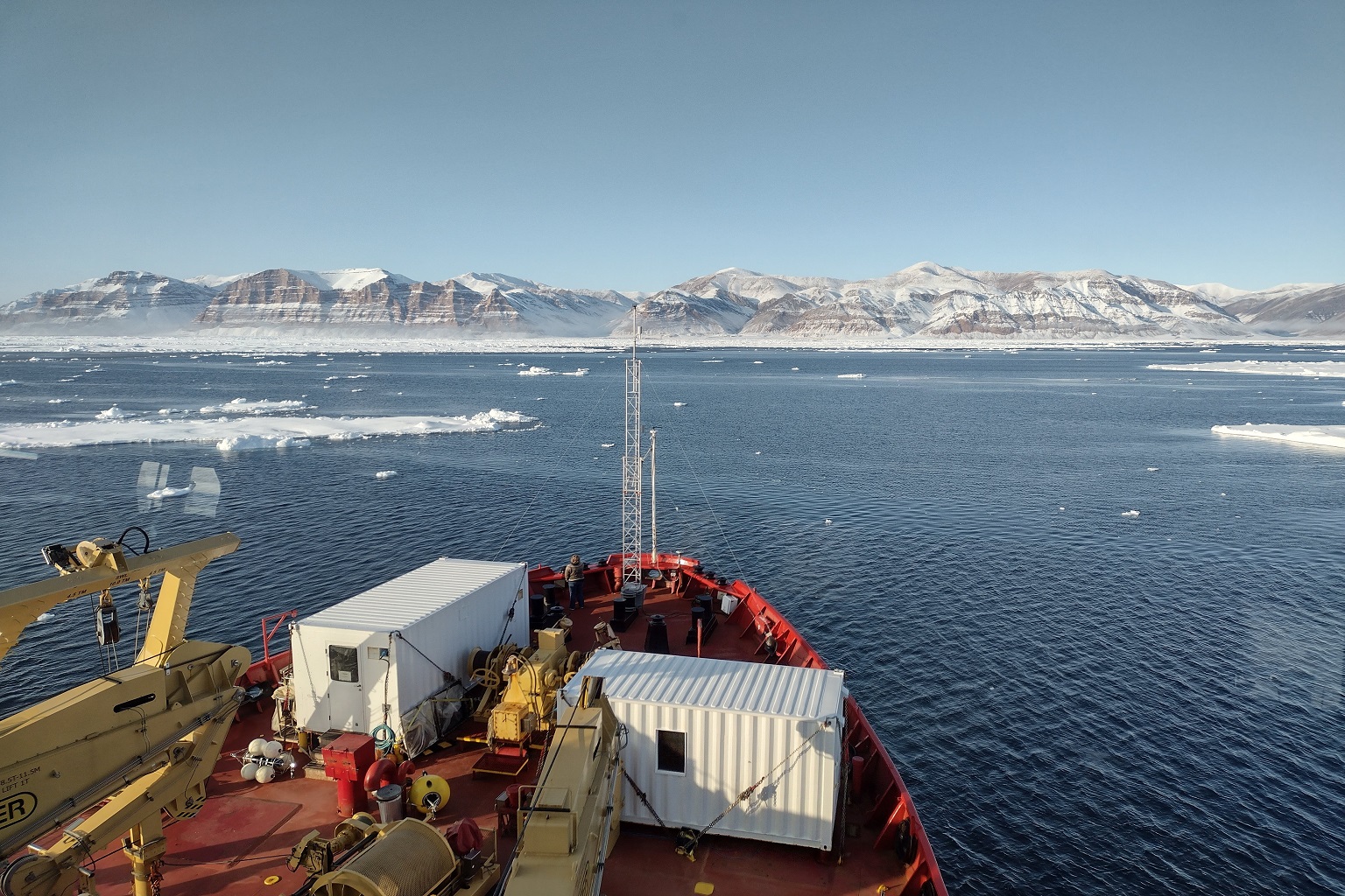 Sailing through Nares Strait, between Ellesmere Island and Greenland. The extent of ice shown is the "new normal," though historically there was more sea ice in the region; the ice is also becoming more dynamic, changing more between seasons and years compared to previously. These drastic changes are already affecting fisheries in the region.