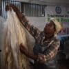 After separating the edible pulp, the leftover enset fibers are collected and used to make durable household items like ropes, mats and baskets. Image by Solomon Yimer for Mongabay.