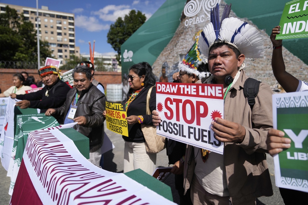 Indigenous leaders from across the Amazon protest against fossil fuels in Bogota, Colombia. (AP Photo/Fernando Vergara)