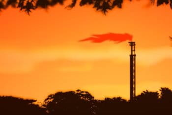 A depiction of a gas flare in Putumayo, Columbia. (AP Illustration/Peter Hamlin)