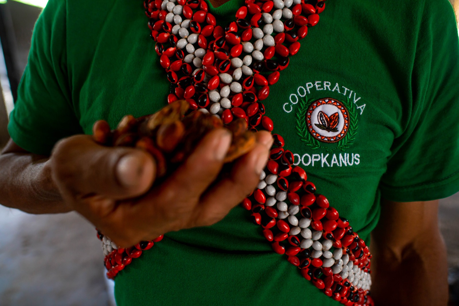 A member of the Kanus Multiservices Cooperative, a project for the economic development of farmers in the Kanus Basin, wearing a tradition Wampís utsupak (chest piece). Image courtesy of Maria Goretii/Convoca. 