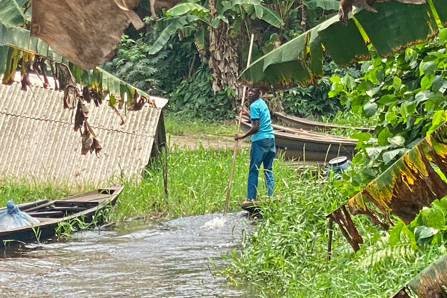 Sixteen-year-old Jonathan, navigating his canoe, set for fishing.