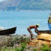 Fishers with their canoes in São Tomé.