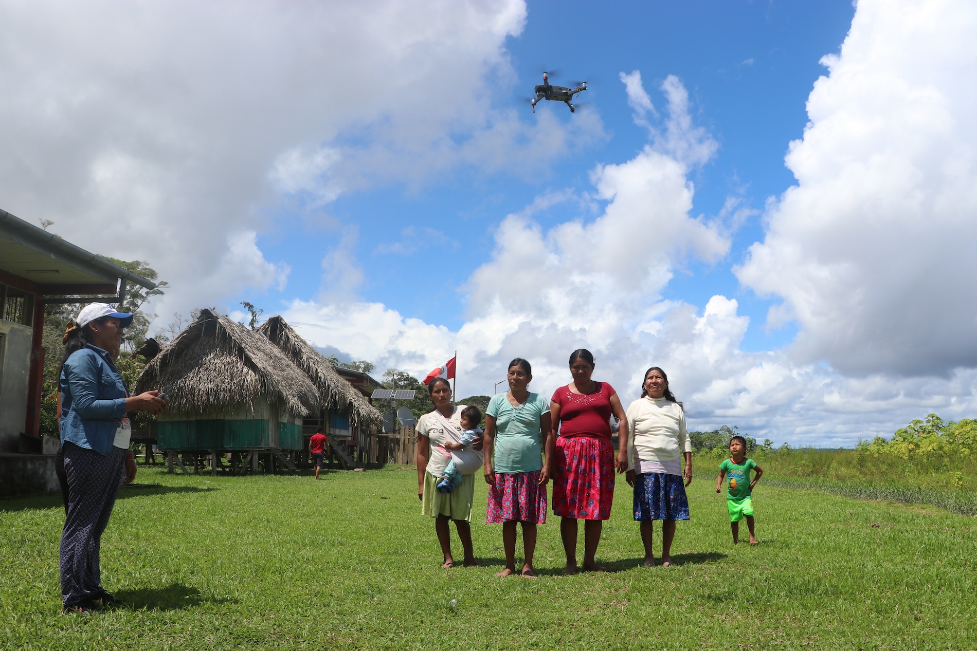 Women trained through Rainforest Alert learn how to utilize technology, including GPS, drones and satellite alerts, to help them monitor the forest. Image courtesy of Pamela Huerta/Rainforest Foundation US.