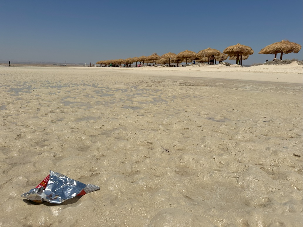 Beach umbrellas recently put up at Ras Hankorab Beach. Image by Mongabay.