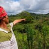 Datu Cornelio Melayao points to a patch of greenery tribal members reforested decades ago.