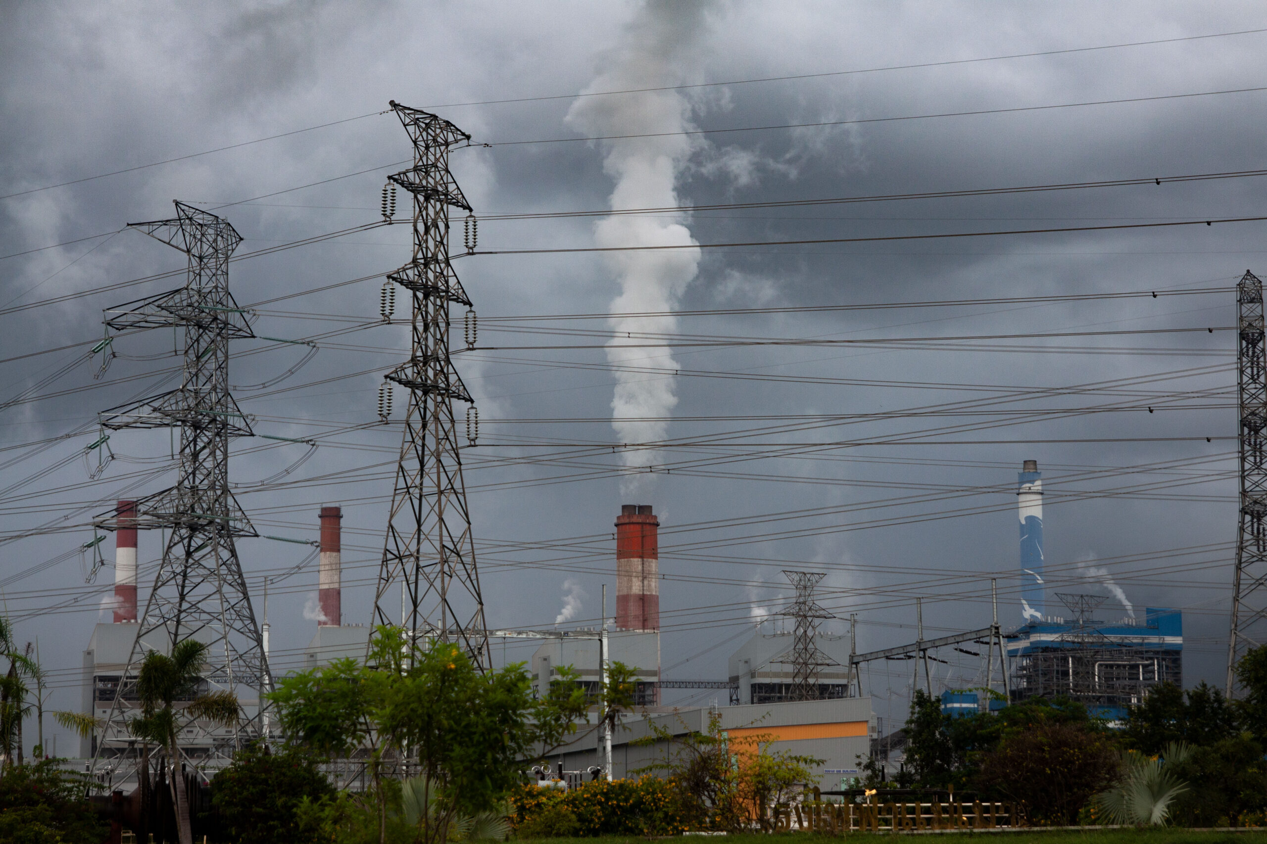 While EGAT reports that it has installed new technology into some of the Mae Moh power plant's units to reduce emissions, the smokestacks pump pollution into the air day and night, according to residents living nearby. Image by Gerald Flynn / Mongabay.