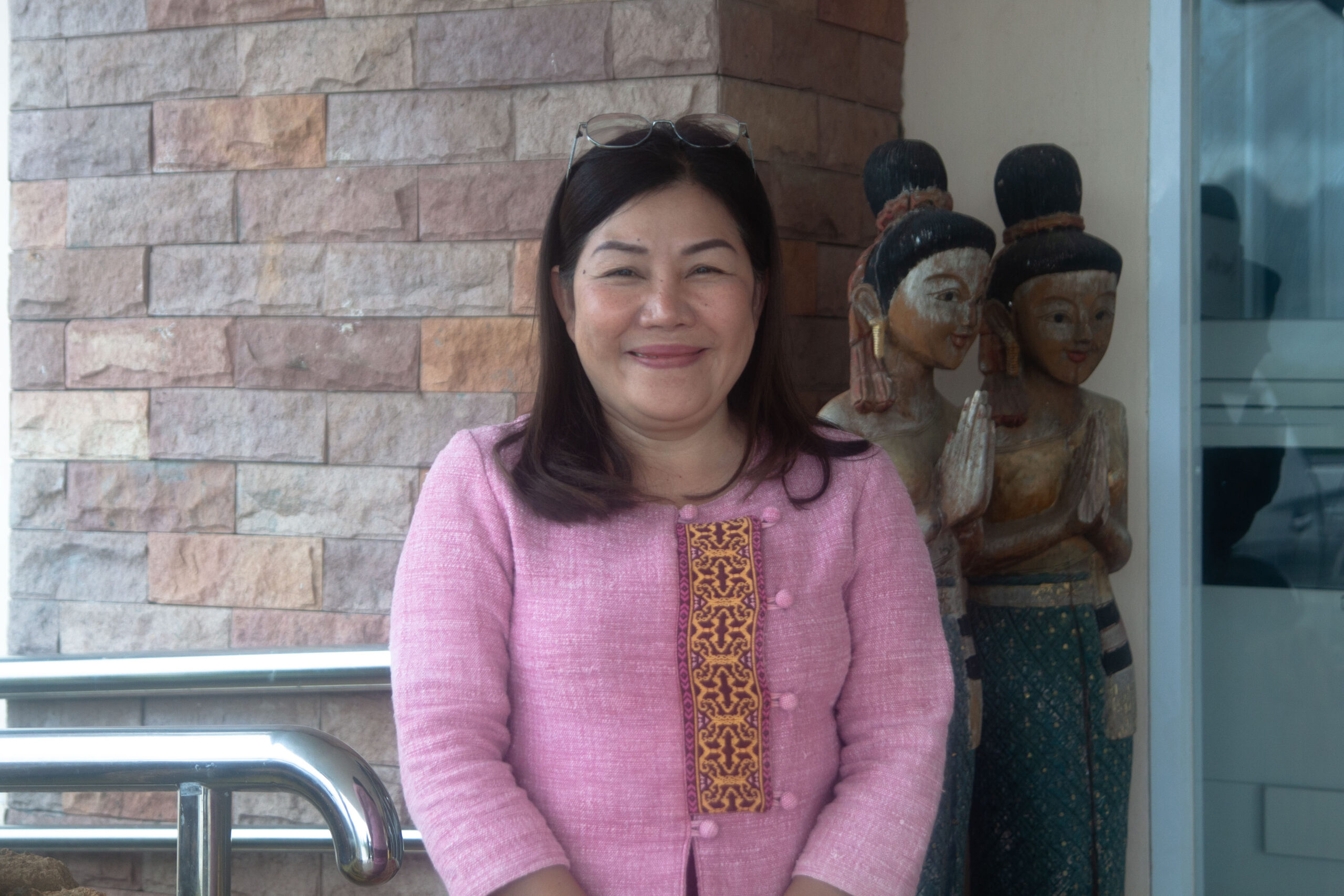 Sunisa Thiyu, deputy mayor of Sop Pad subdistrict administrative organization in Mae Moh district, hopes to see EGAT address the environmental and health problems created for her community, as well as a responsible winding down of operations that now sustain the local economy. Image by Gerald Flynn / Mongabay.