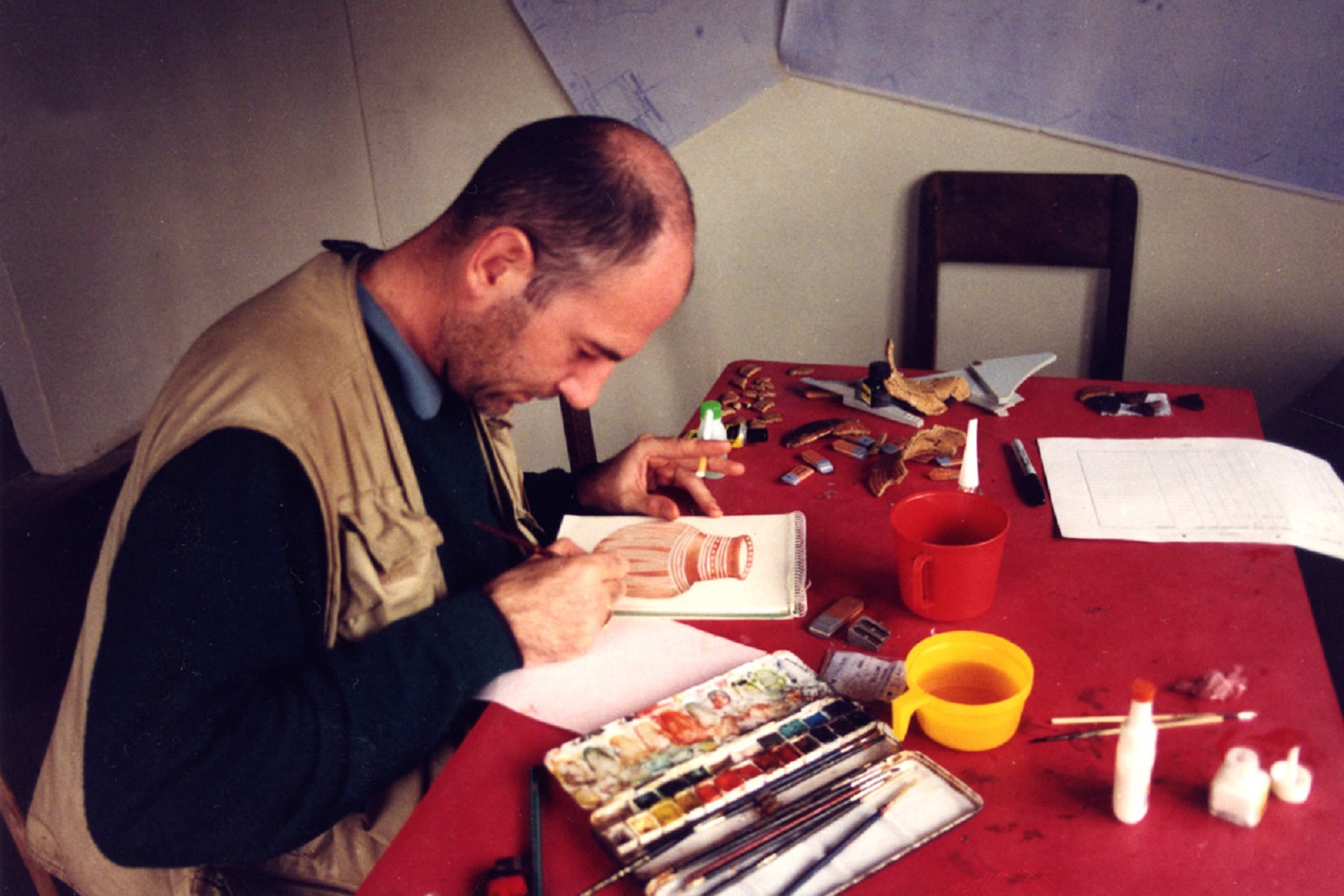 Archaeologist or artist? Rostain meticulously painting while excavating in the Upano Valley in Ecuador in 1998.