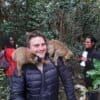 Willie Shubert in Madagascar with lemurs at a rehabilitation center. Note: visitors are not permitted to touch lemurs, but lemurs do as they please. Photo by Rhett Ayers Butler