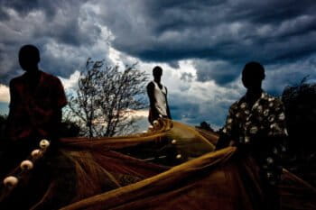 Fishers with a net at Lake Victoria in Kenya.