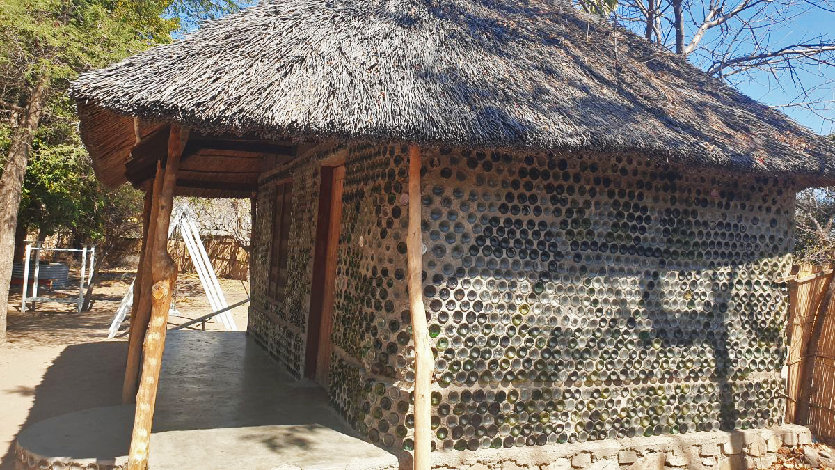 A HEEED building with walls fashioned from bottles collected underwater and during beach and village cleanups.