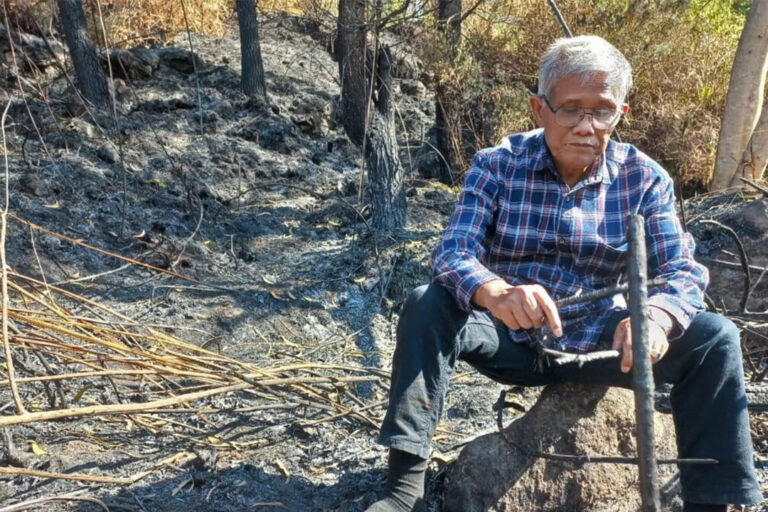 Wilmar Simandjorang on his conservation land that burned in 2025.