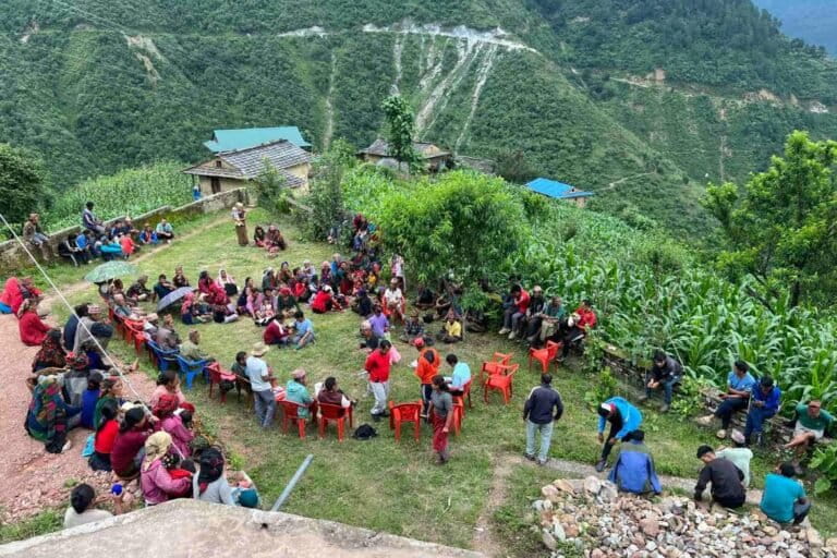 Community people in Jhumlabang gathered in a community meeting in July. Image courtesy of Jhumlabang Village Foundation (JVF).