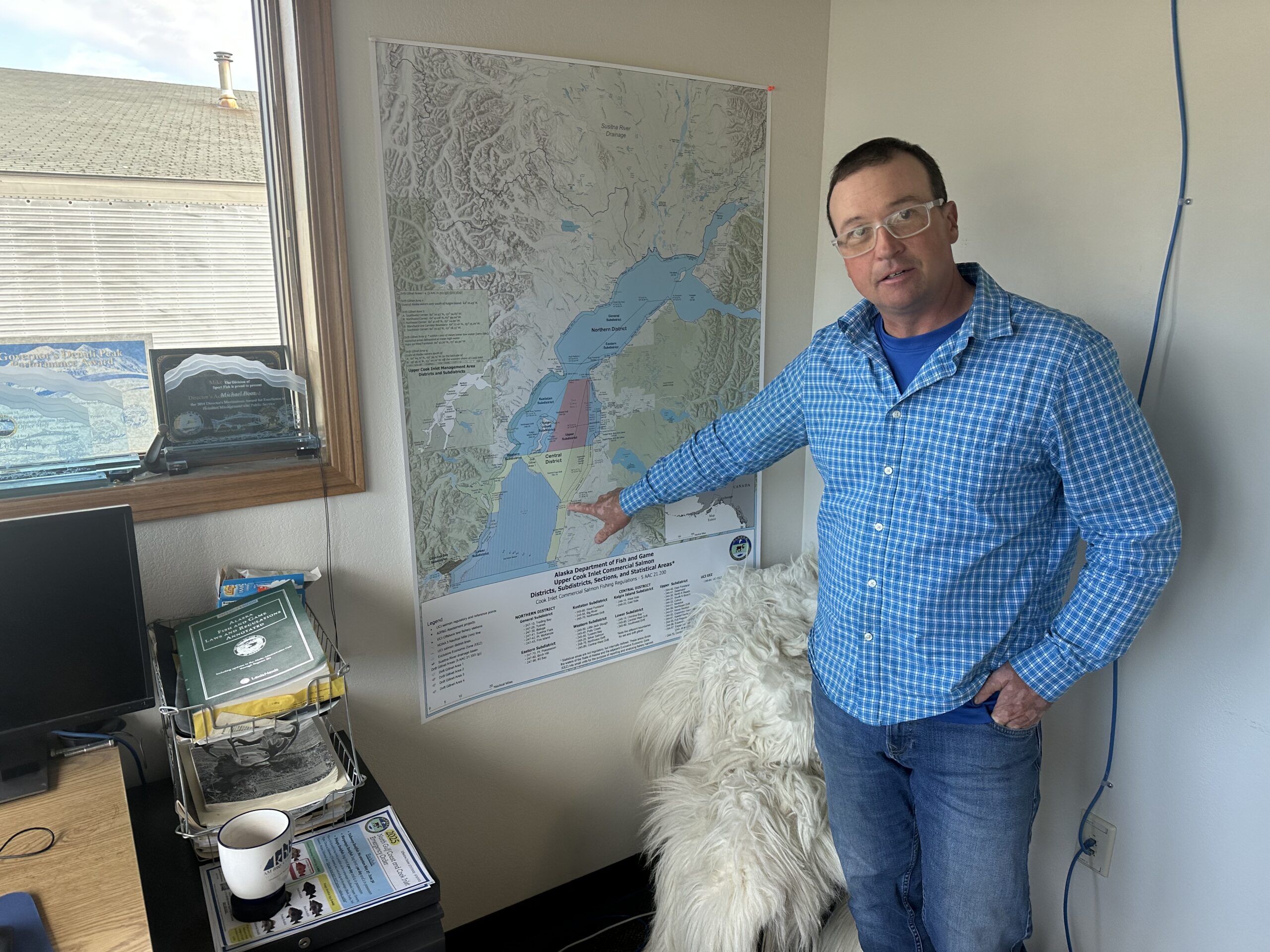 Mike Booz, a biologist with the Alaska Fish and Game Department in Homer, studies sea otters.