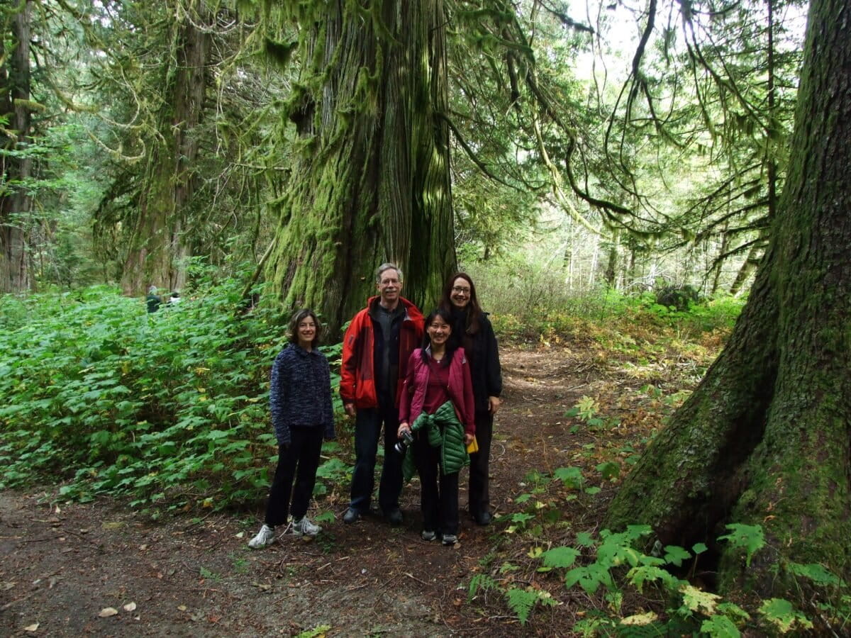 Chris Allnutt with three colleagues who worked on the Great Bear Rainforest campaign. Image by Jens Wieting