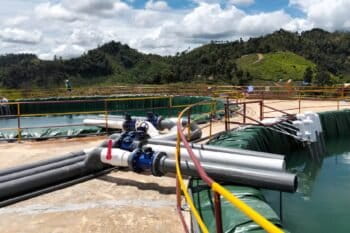 Leaching ponds have been drilled into the mountains of Laos, using a mix of toxic chemicals to separate the rare earth minerals from the other materials siphoned out of the ground. Image supplied by source.
