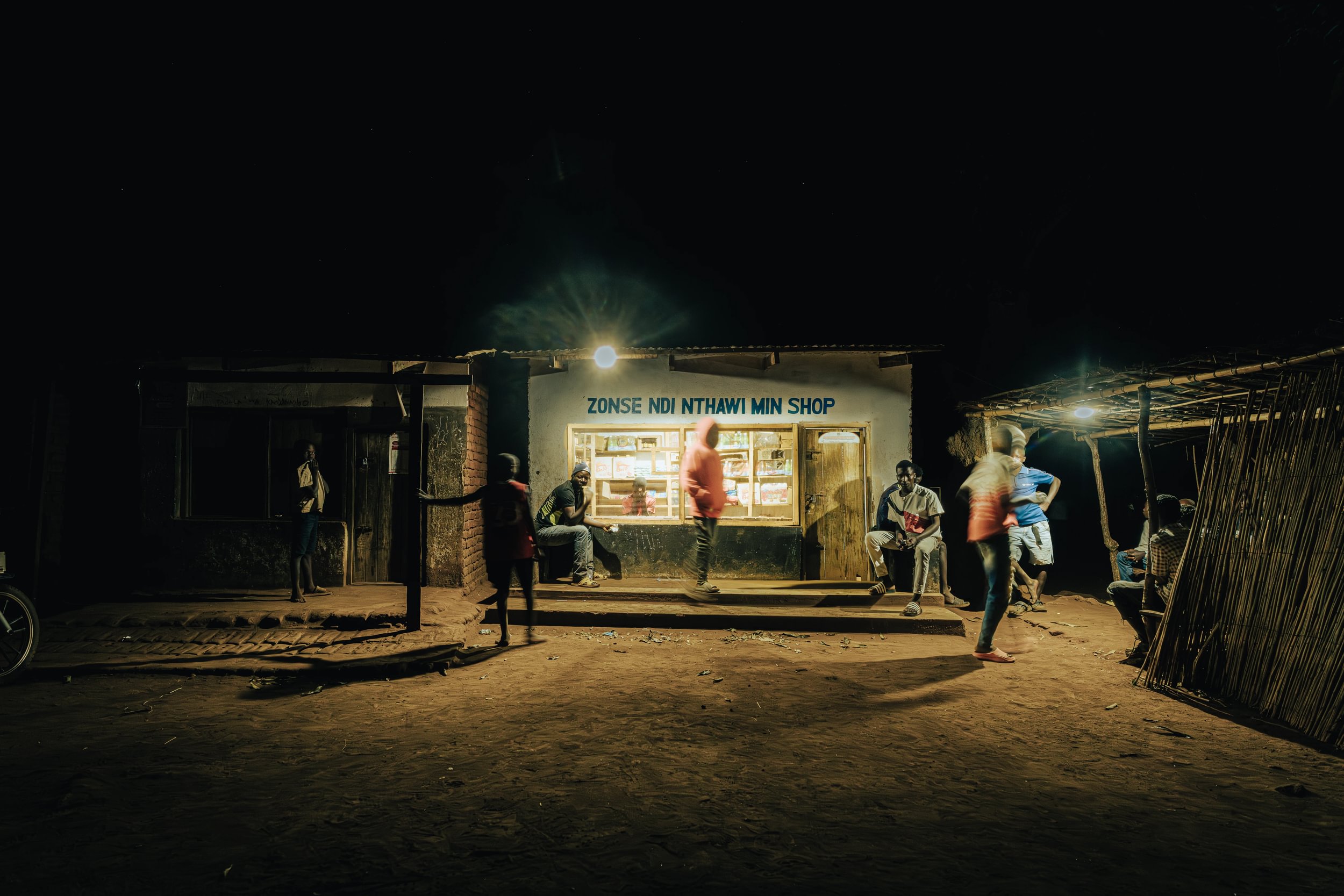 Off-grid solar quickly and affordably provides light to the community. Image courtesy of Kondwani Jere/SolarAid.