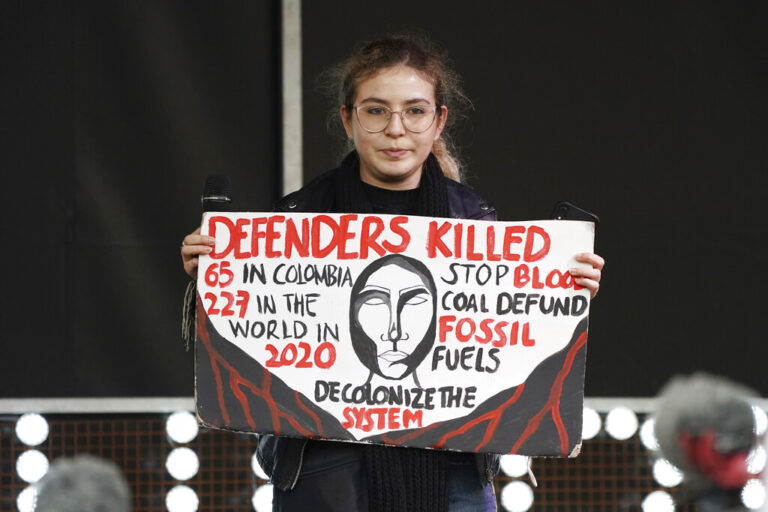 Colombian climate activist Sofía Gutiérrez on stage after a march through the streets of Glasgow, Scotland, host city of the COP26 U.N. Climate Summit. Image by AP Photo/Jon Super.