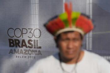 An Indigenous man takes part in a demonstration in defense of the Amazon during the COP30 U.N. Climate Summit, in Beléem, Brazil, Thursday, Nov. 6, 2025. Image by AP Photo/Eraldo Peres.