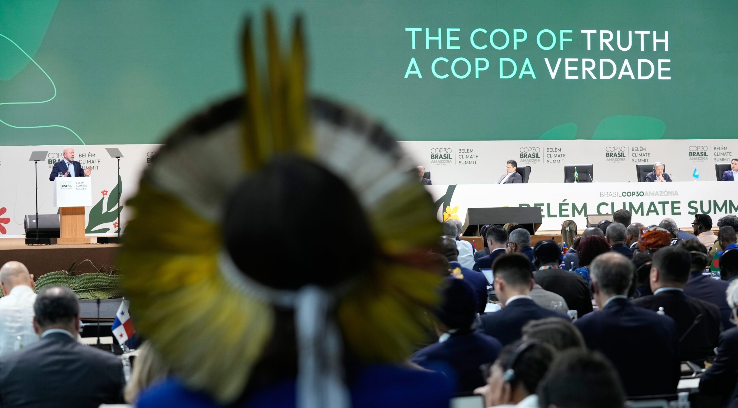 Delegates listen to Brazilian President Lula deliver the opening speech of the COP30 U.N. Climate Summit in Belém, Thursday, Nov. 6. Image by AP Photo/Eraldo Peres.