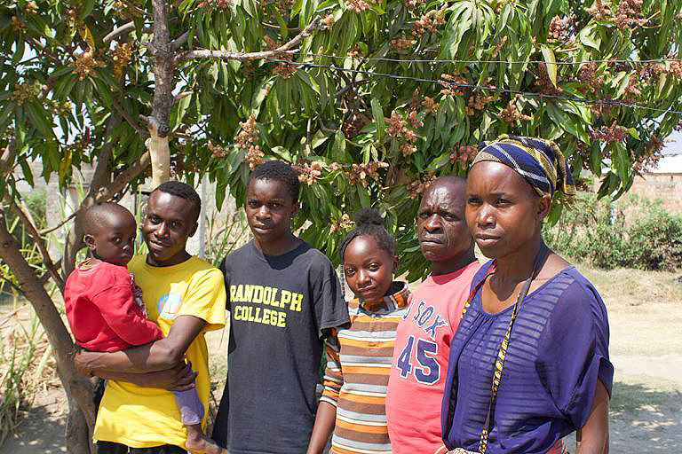 From left to right: Youth activist Oliver Nyirenda (in yellow), with his family in Kabwe. 