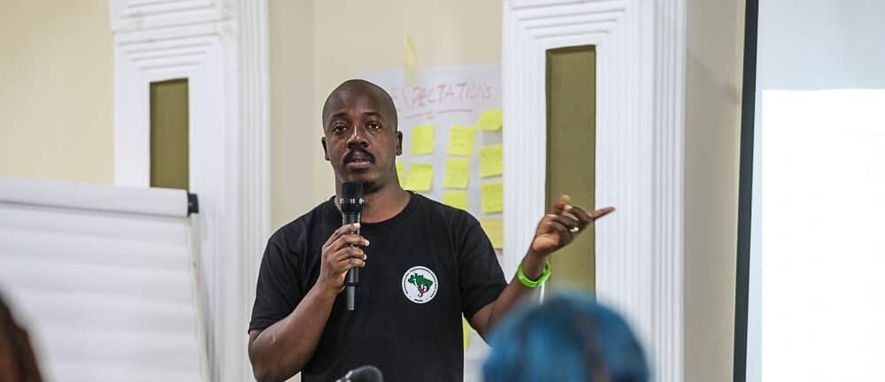 Banner image: Ange-David Baïmey, Africa program coordinator for the NGO GRAIN. Image courtesy of Ange-David Baïmey.