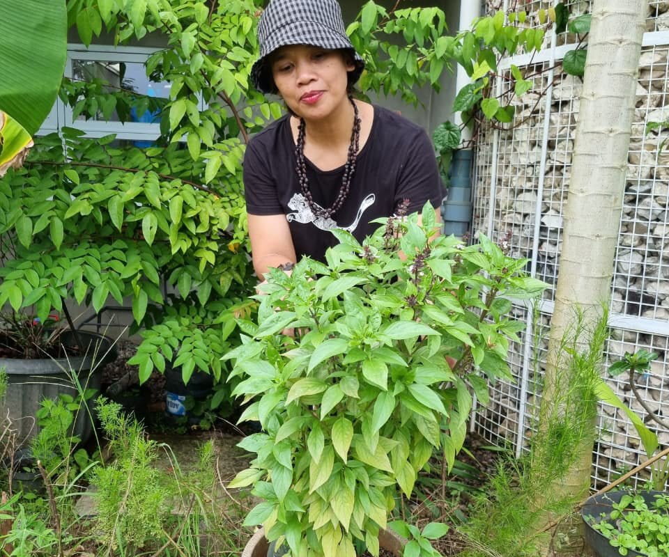 Sapariah Saturi in her garden. Photo courtesy of Saturi.
