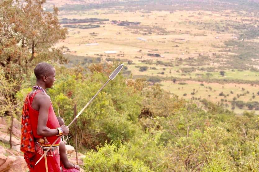 A man overlooking lands in the Nashulai Maasai Conservancy. Image © Marianne Nord, courtesy of Nashulai Maasai Conservancy.