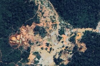 Satellite image showing the destruction of the Sararé Indigenous Territory in Mato Grosso state, Brazil, left behind by illegal gold mining. Image via Google.