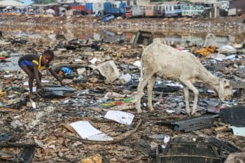 A child at work collecting e-waste in the Agbogbloshie dump in Ghana.