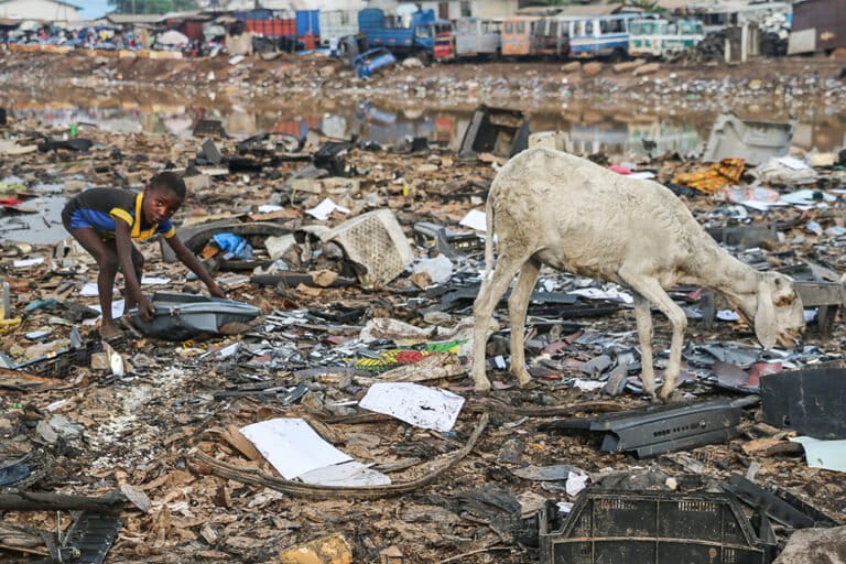 A child at work collecting e-waste in the Agbogbloshie dump in Ghana.