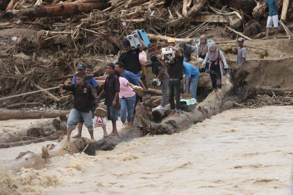 More than 1,400 dead across Asia after ‘rare’ cyclone & typhoon converge