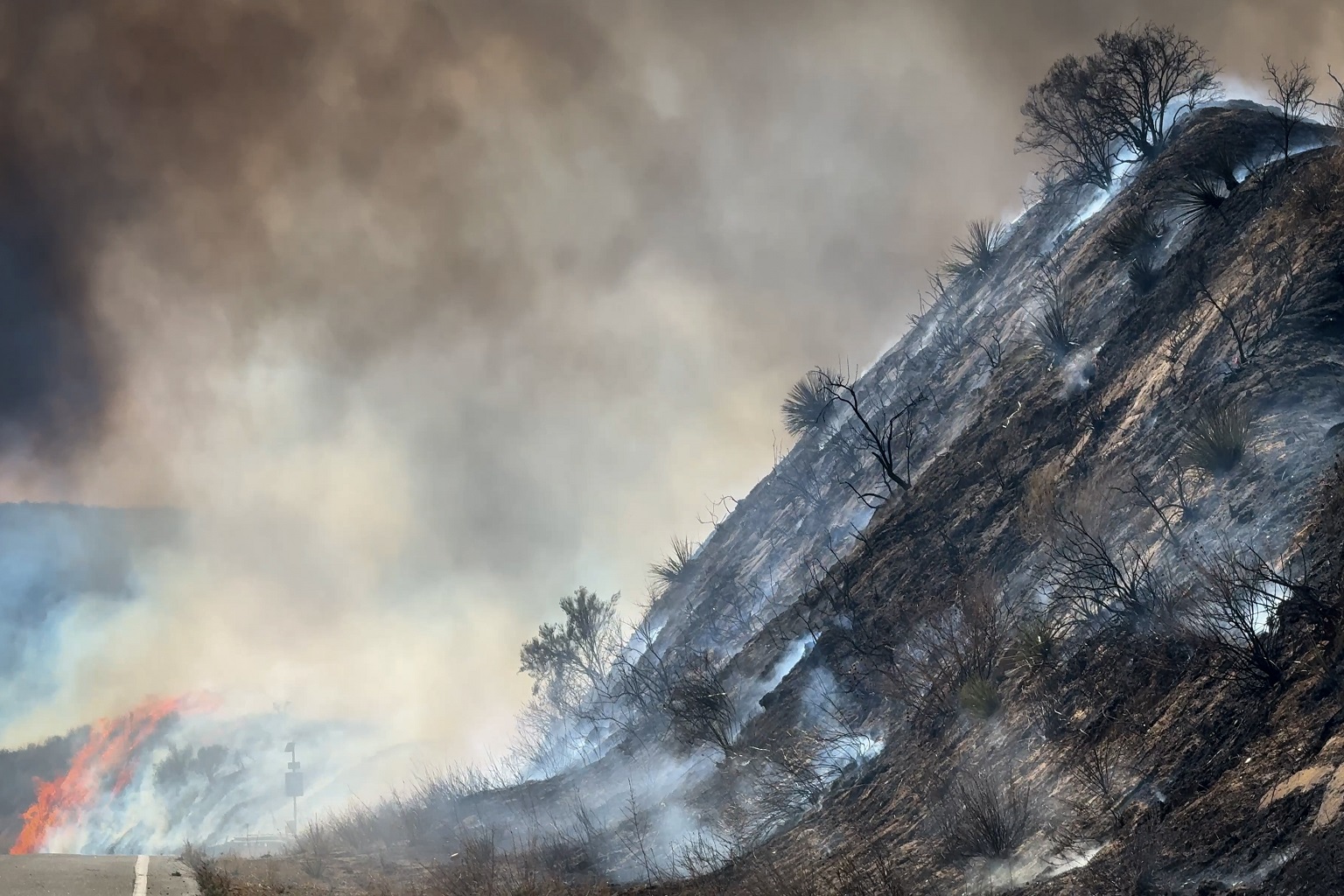 The Hughes fire burning in Southern California in 2025.