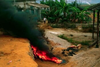 Open burning of plastic in a community in Guiyu, China. This practice is fast becoming a common way to dispose of plastic and other waste.
