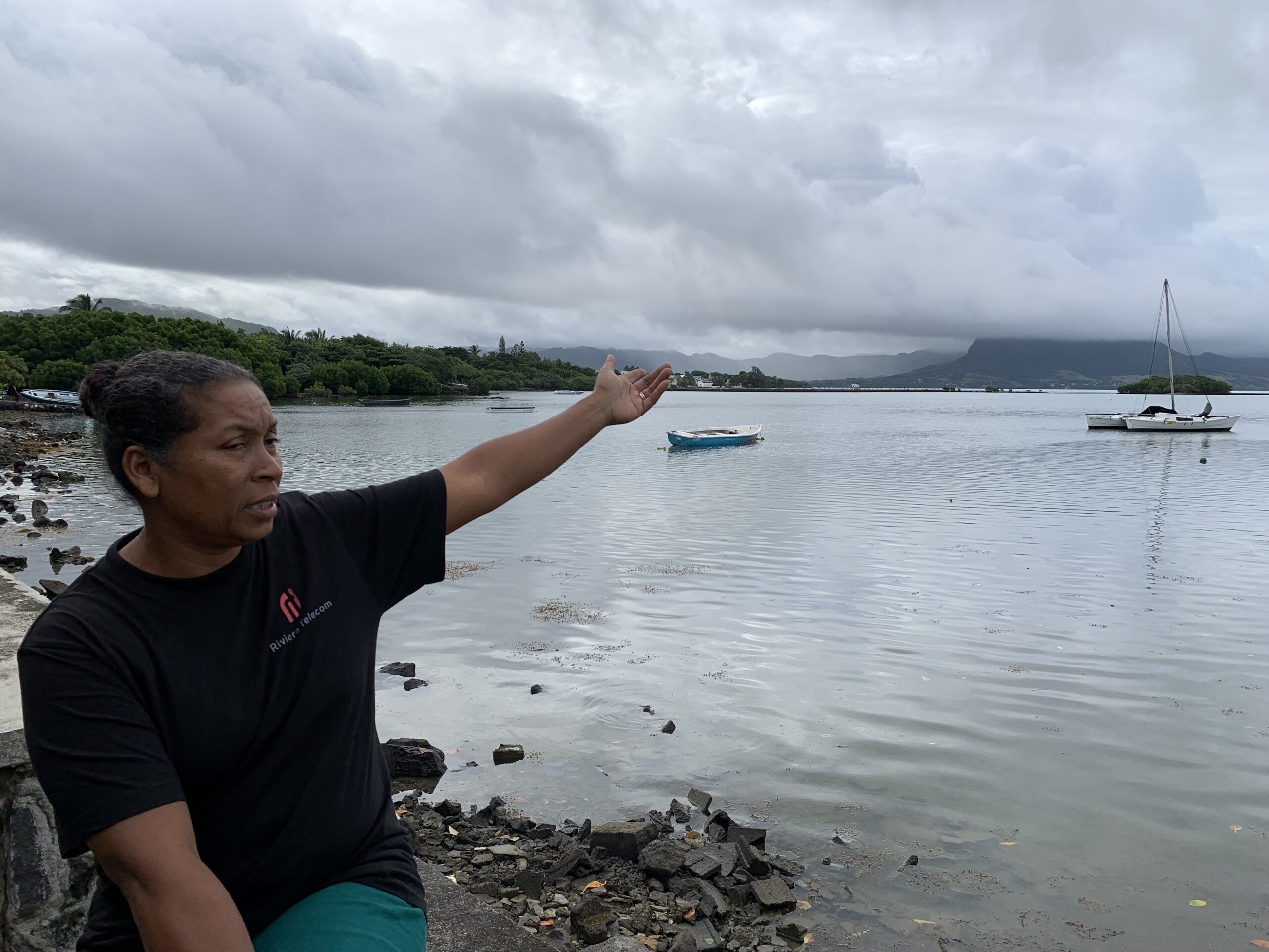 Sandy Monrose at the waterfront near her house. Image by Malavika Vyawahare/Mongabay.