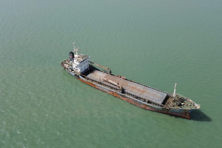 A cargo vessel operated by Shanghai Pesca SARL, anchored on the Geba River near the capital, Bissau. Image by Josef Skrdlik for Mongabay.