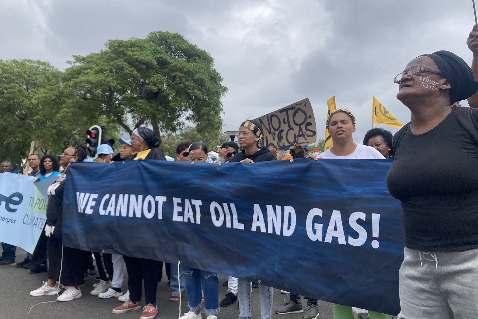 Fishers and civil society members protest fossil fuel expansion plans outside South Africa’s Parliament. The protest was organized by local NGO The Green Connection. The South African government has included the oil and gas sector in its blue economy planning, though the scope of the term is a matter of global debate.