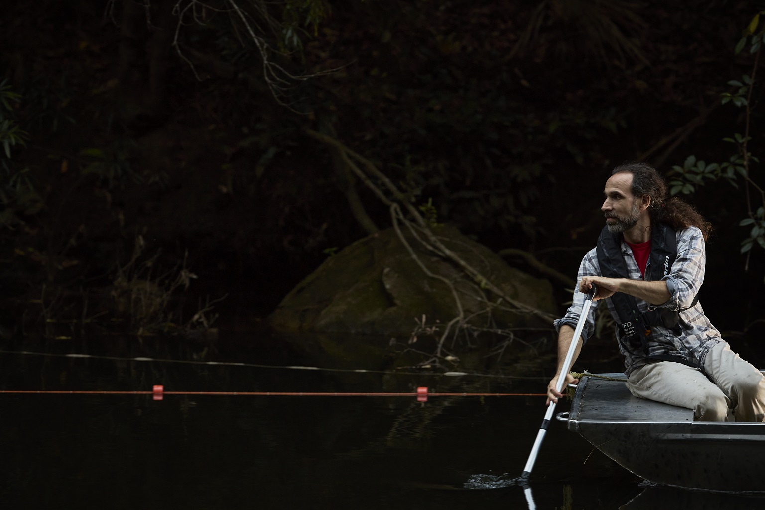 Gilad Bino, a researcher at the University of New South Wales, surveys a river, looking for platypus.