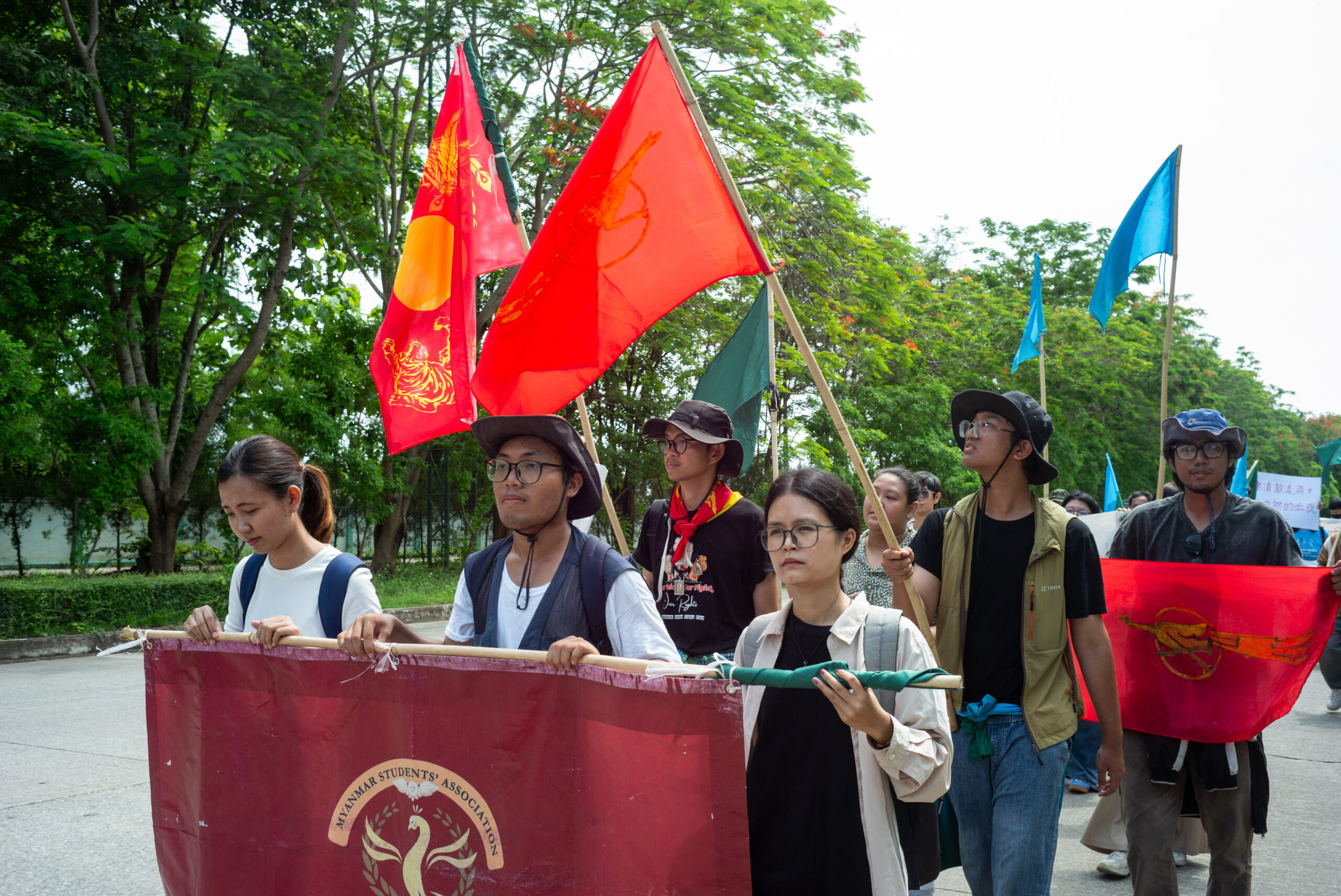 Local residents and students march alongside the Peace Walk delegation to mark World Environment Day in Chiang Rai, Thailand, on June 5, 2026. Photo by Ta Mwe.