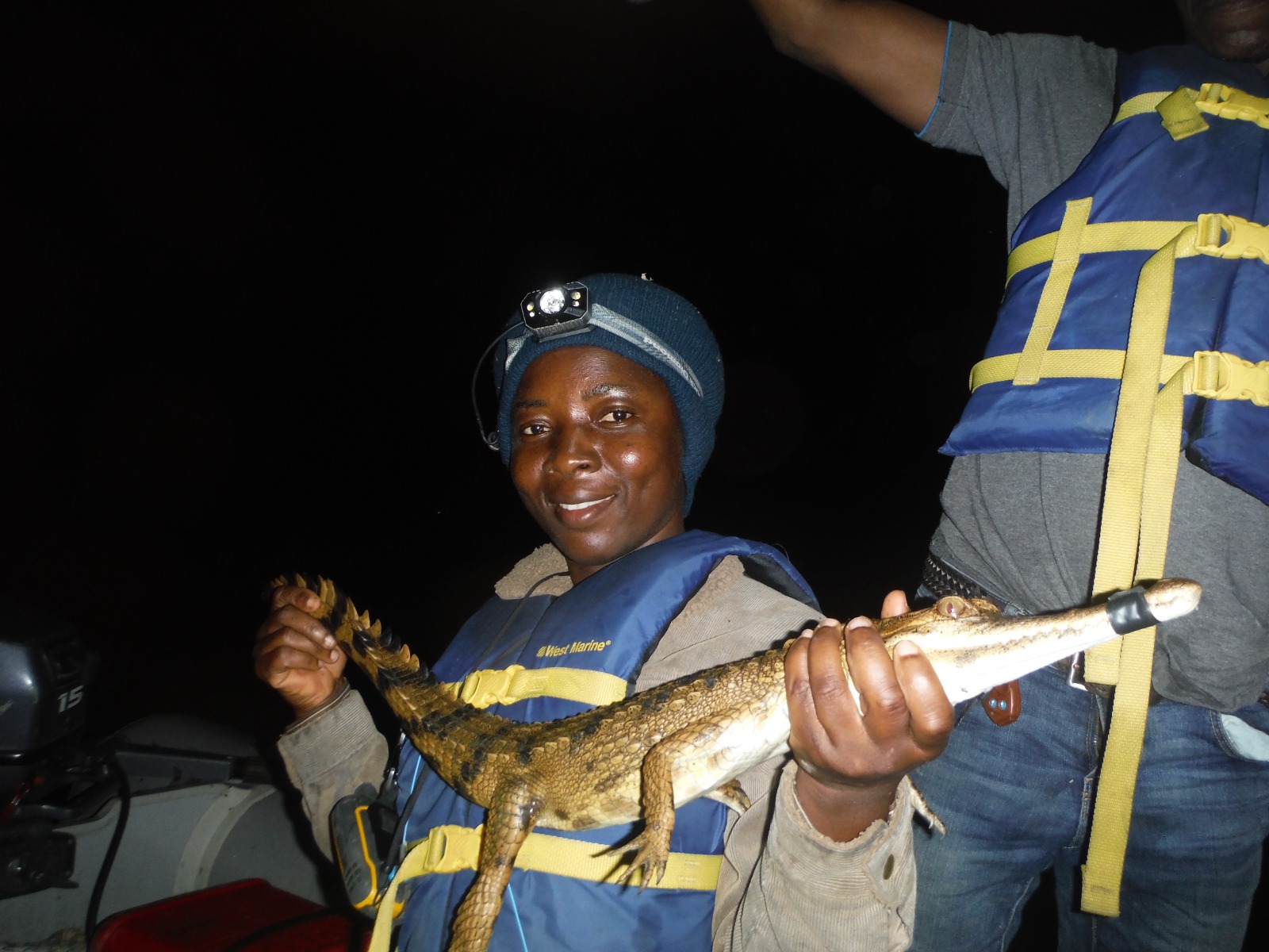 After years spent handling the animals, says Kouman, ‘I’m still in one piece’. All animals caught are measured and examined and safely released back into the river. Image courtesy of Landry Wah.
