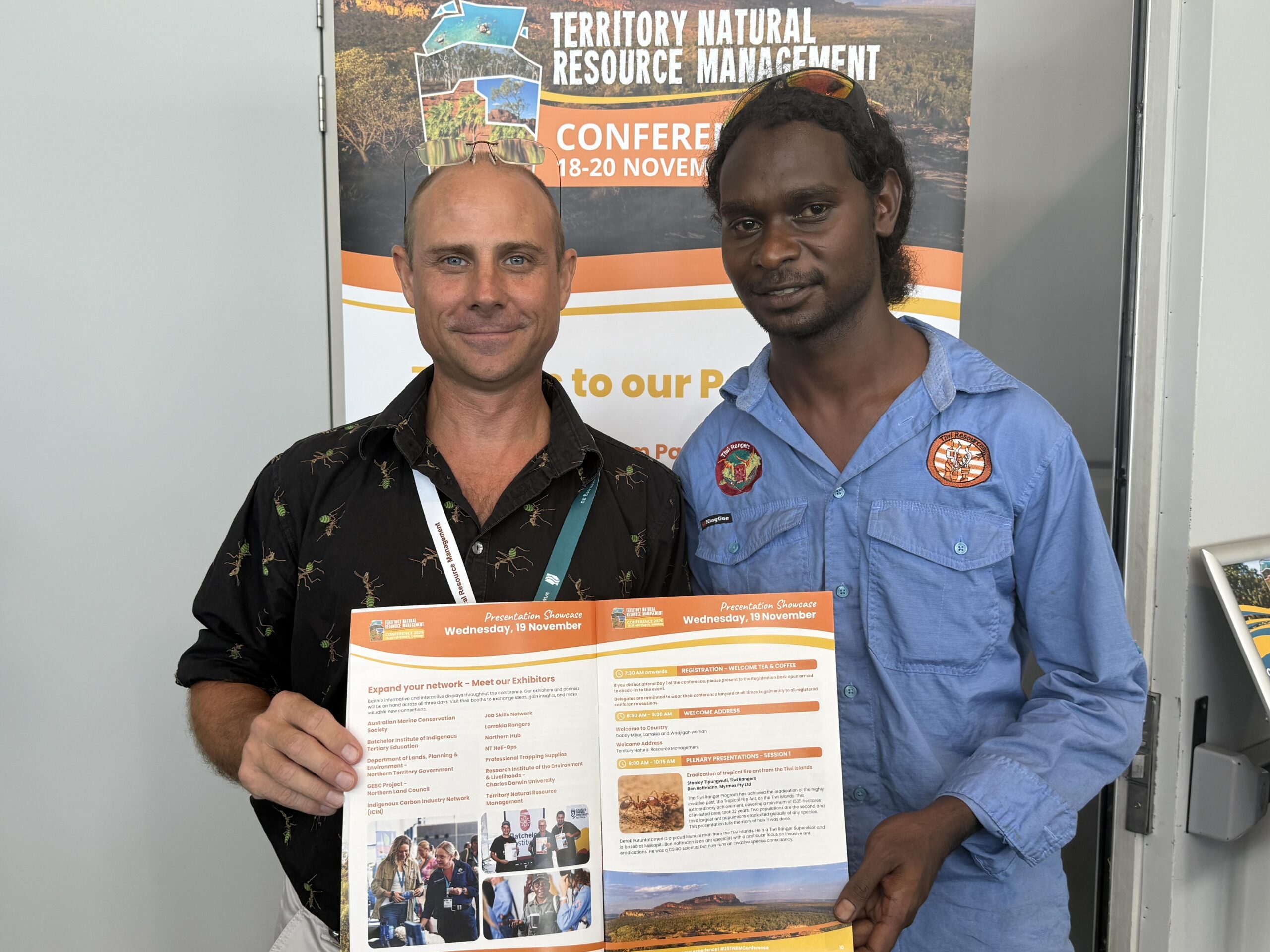 Dr Ben Hoffmann from Myrmex (left) and Tiwi Ranger, Stanely Tipungwuti, gave the Plenary Presentation on the Tiwi Tropical Fire Ant project at the Territory NRM conference in November 2025. Image by the Territory Natural Resource Management Award, supplied by Tiwi Resources.