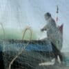 A fisher at Saude Beach in Kochi. Image by Robert Bociaga for Mongabay.