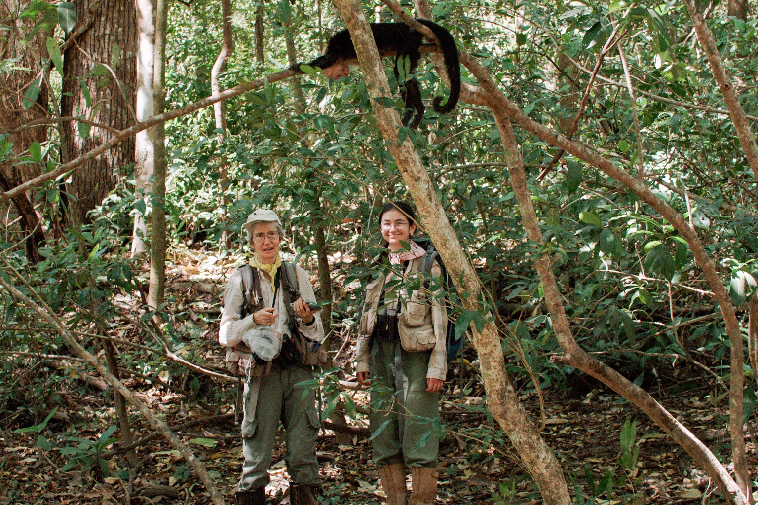 Susan Perry and her daughter, Kathryn, observe and collect data on capuchin monkeys in the field.
