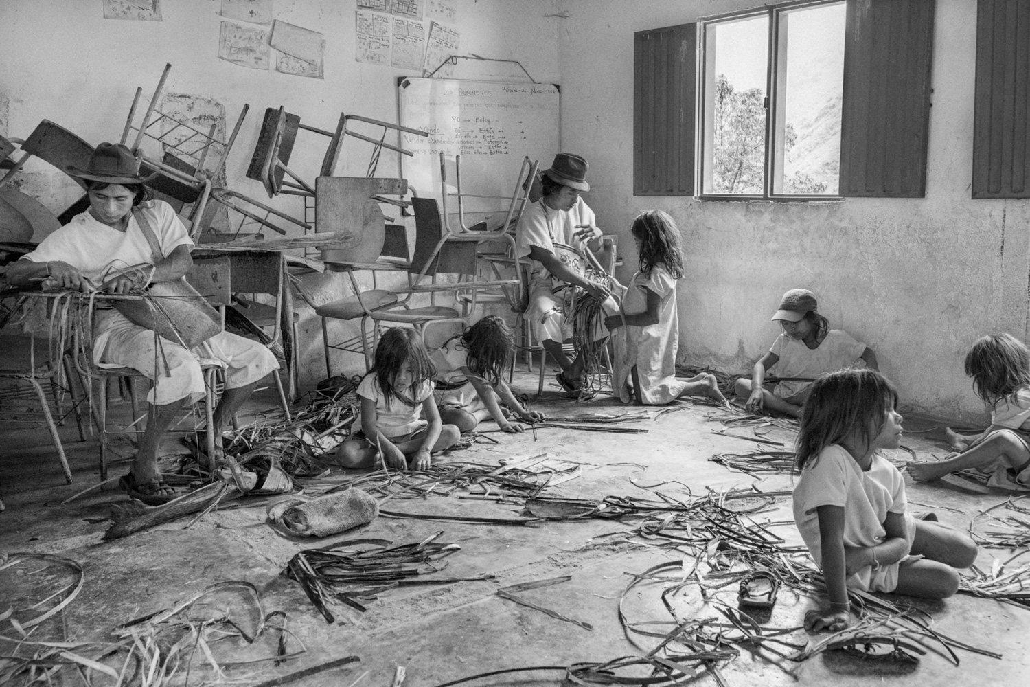 Children of different ages and settlements receive primary education from native and non-native teachers. Children of different ages and settlements receive the primary education from native and non-native teachers. Children in the community receive both Western and traditional education during their primary years. The community offers schooling up to high school. Across Colombia, various tribes are establishing Indigenous universities to provide academic formation. Image by Roberto Maccariello.