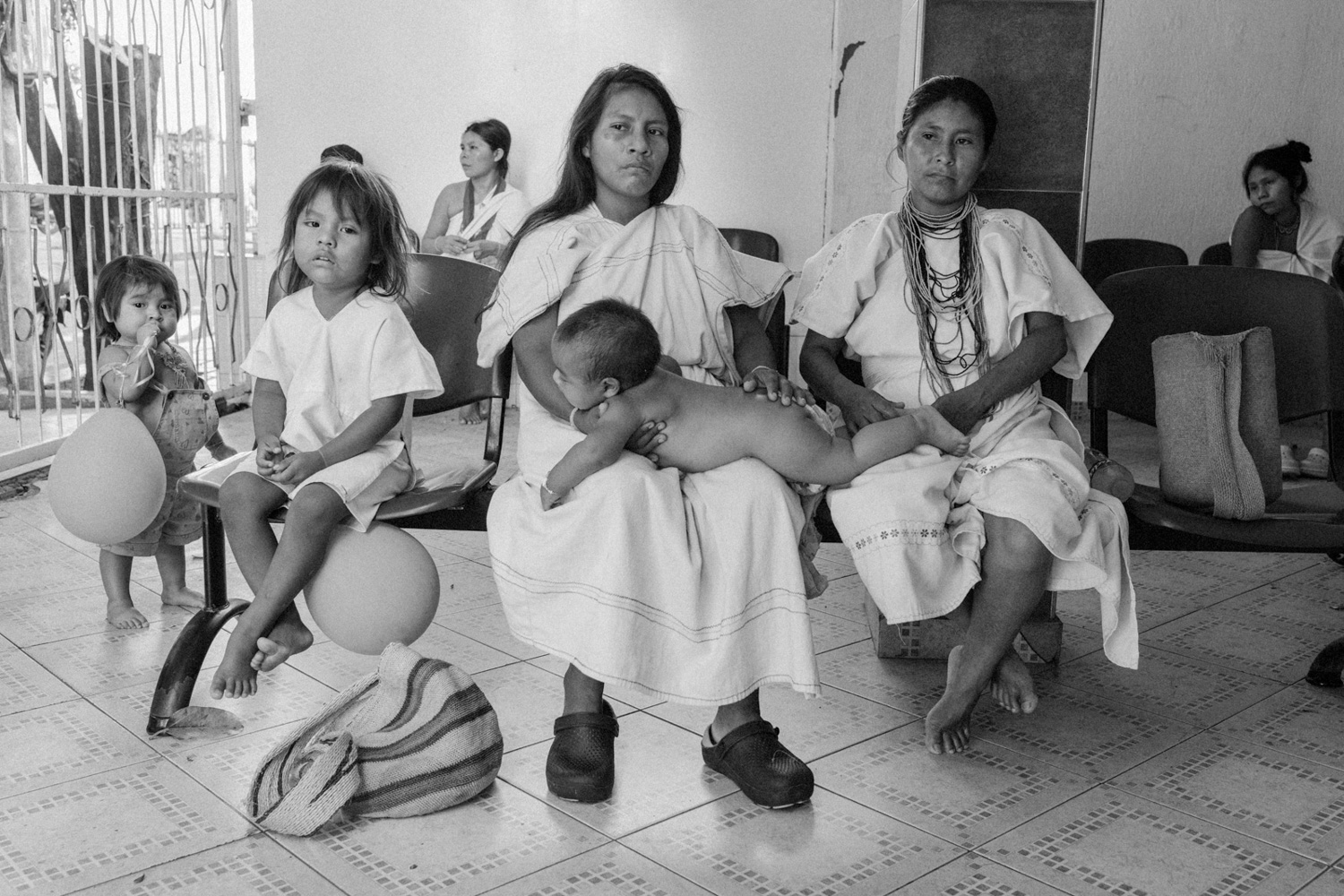 A young Arhuaco woman and her baby are temporarily displaced after her community was the theater of an armed clash between two paramilitary groups, Santa Marta, Colombia, 2026. They were both wounded by shrapnel after drone-delivered bombs detonated during an intense armed confrontation between rival paramilitary groups near his community. From this moment, she is temporarily displaced and is receiving health and psychological care in Santa Marta. The incident highlights a dangerous evolution in the region's warfare, directly impacting innocent Indigenous populations.