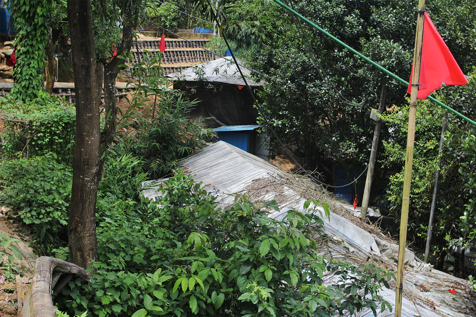At Camp 4 in Kutupalong, Ukhiya, several slope units marked with red flags were found to be still occupied by dwellers.
