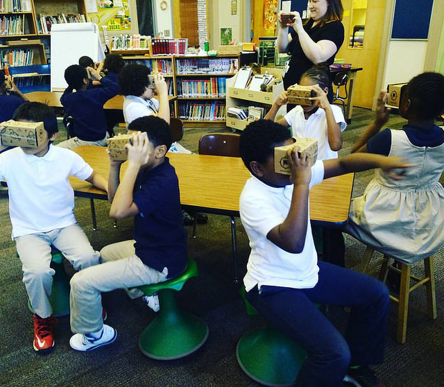 Kids taking virtual field trips in the classroom using Google Cardboard. Photo credit: Melissa Lim. 