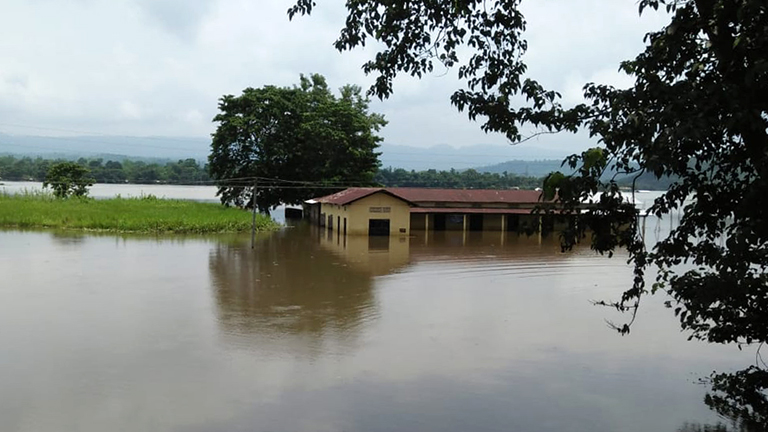 A submerged house in Kohora, the main entry point to Kaziranga National Park. Photo by Nabarun Guha.